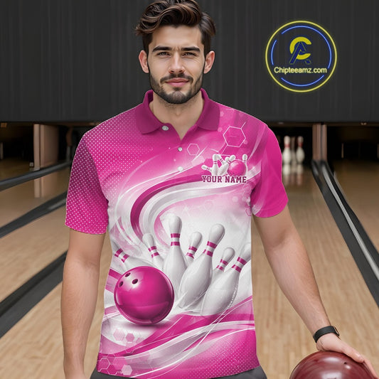 Male model standing in a bowling lane wearing a white and pink bowling polo shirt featuring abstract wave lines and a glossy bowling ball striking pins on the front.