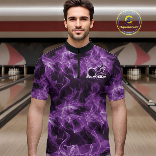 Male model wearing a purple bowling quarter-zip in a bowling lane with fiery bowling ball graphics.