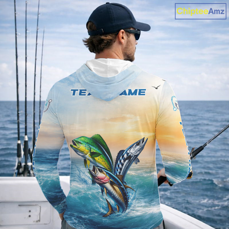 Angler wearing mahi mahi wahoo tuna blue hooded performance fishing shirt on boat with custom team name on the back