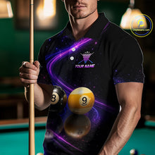 Load image into Gallery viewer, A man wearing a black short-sleeve polo shirt with a purple and blue galaxy print, featuring a crown logo and the text 'YOUR NAME' on the chest. He is holding a pool cue in a dimly lit pool hall environment.