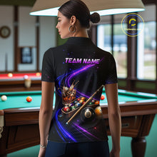 Load image into Gallery viewer, A woman stands in a billiards room wearing a black short-sleeve polo shirt with a vibrant purple and blue graphic print on the back featuring pool balls, a cue stick, and the text 'TEAM NAME'.