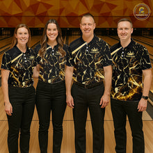Load image into Gallery viewer, Group of four wearing custom black gold bowling shirts front view featuring glowing bowling ball artwork with lightning energy effect and black gold marble crack pattern at the bowling alley