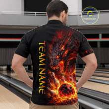 Load image into Gallery viewer, Man wearing a black shirt with a fiery dragon design and 'TEAM NAME' text at a bowling alley.