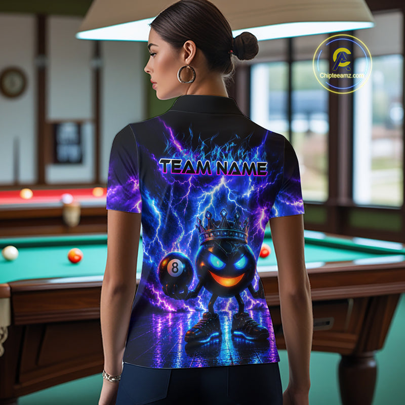 Person wearing a shirt with a colorful design and 'Team Name' text in a pool hall.