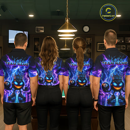 Four people wearing matching team-themed shirts in a room with a pool table.