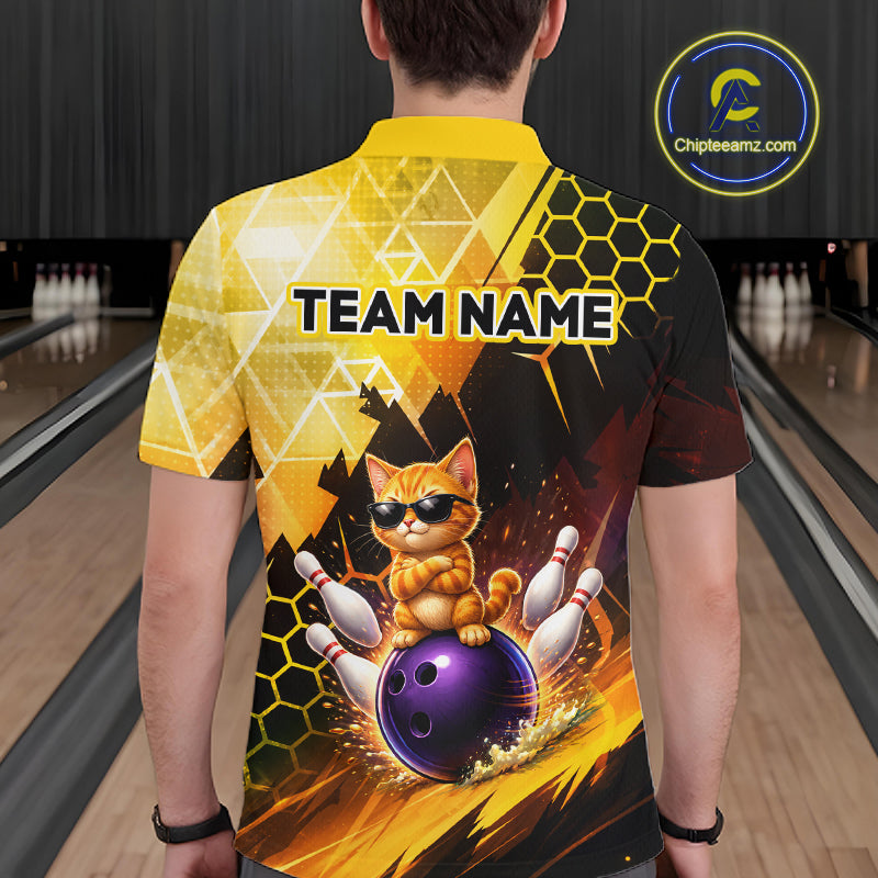 Person wearing a bowling-themed shirt with a cat design in a bowling alley.