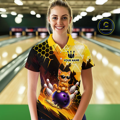 Woman wearing a custom bowling shirt with a cat design in a bowling alley.