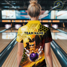 Load image into Gallery viewer, Person wearing a bowling-themed shirt with a cat design in a bowling alley.