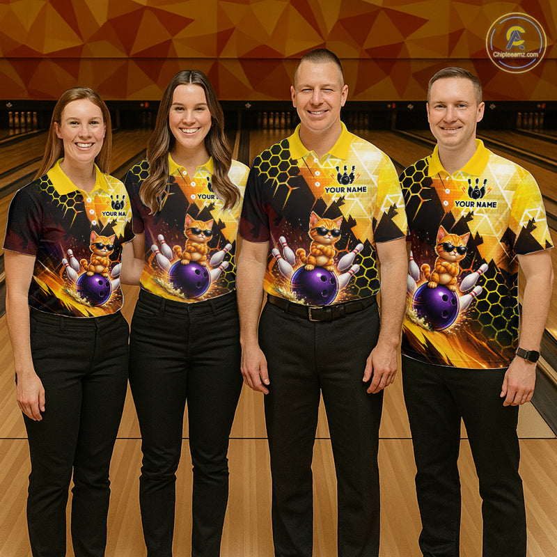 Four people wearing matching bowling shirts with a cat design on a bowling alley.