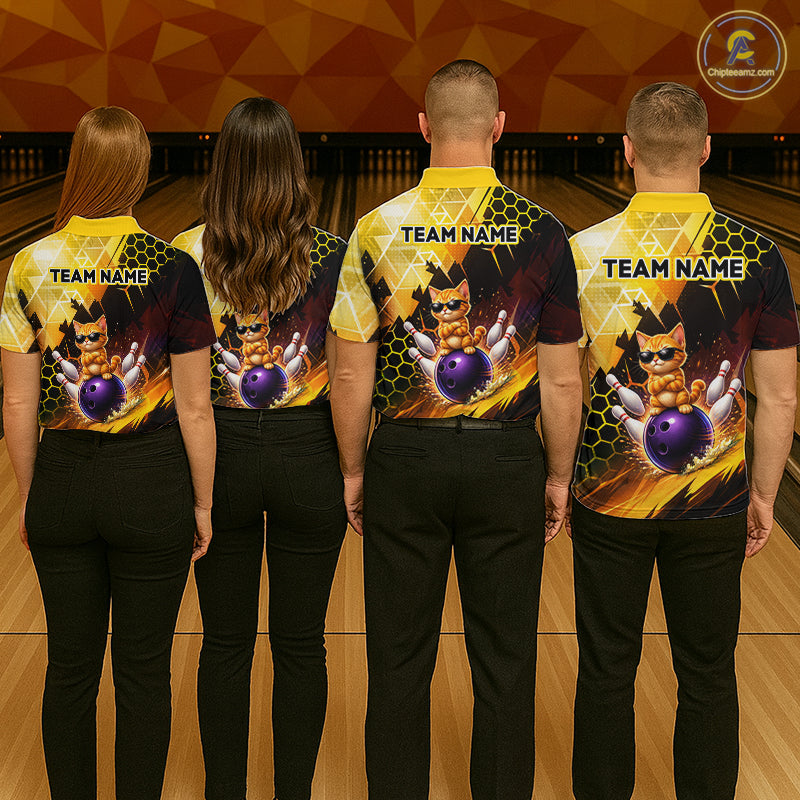 Four people wearing bowling shirts with a team name design on a bowling alley.