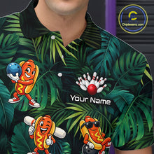 Load image into Gallery viewer, Shirt with cartoon hot dogs and bowling elements on a tropical leaf pattern, featuring 'Chiptleemz.com' logo.