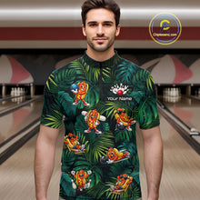 Load image into Gallery viewer, Man wearing a colorful bowling shirt with cartoon characters in a bowling alley.