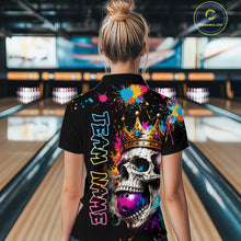 Load image into Gallery viewer, Person wearing a colorful bowling shirt with a skull design in a bowling alley.
