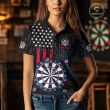 Load image into Gallery viewer, Female model wearing a custom black darts polo shirt featuring an American flag star pattern, a large dartboard graphic, and customizable 'YOUR NAME' text on the chest