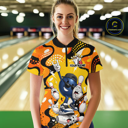 Person wearing a colorful bowling-themed shirt with cartoon characters in a bowling alley.