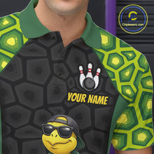 Load image into Gallery viewer, A close-up of a custom printed polo shirt worn by a model. The shirt features a black and dark gray turtle-shell pattern on the body, green collar and sleeve cuffs, and a lime green patterned design on the sleeves.