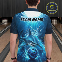 Load image into Gallery viewer, Person wearing a blue bowling shirt with a shark design and 'Team Name' text in a bowling alley.