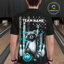 Load image into Gallery viewer, Person wearing a black shirt with a raccoon graphic and 'TEAM NAME' text in a bowling alley.