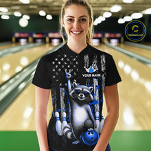 Load image into Gallery viewer, Person wearing a black shirt with a raccoon graphic and text in a bowling alley.
