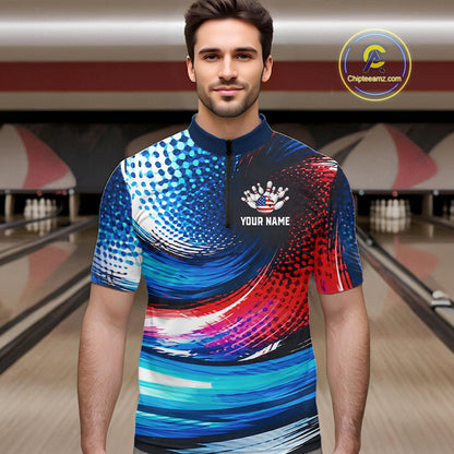 A man wearing a short-sleeve quarter-zip bowling shirt with a vibrant blue, red, and white abstract swirl pattern. The shirt features a black collar and a black chest panel with a white crown graphic and the text 'YOUR NAME'.