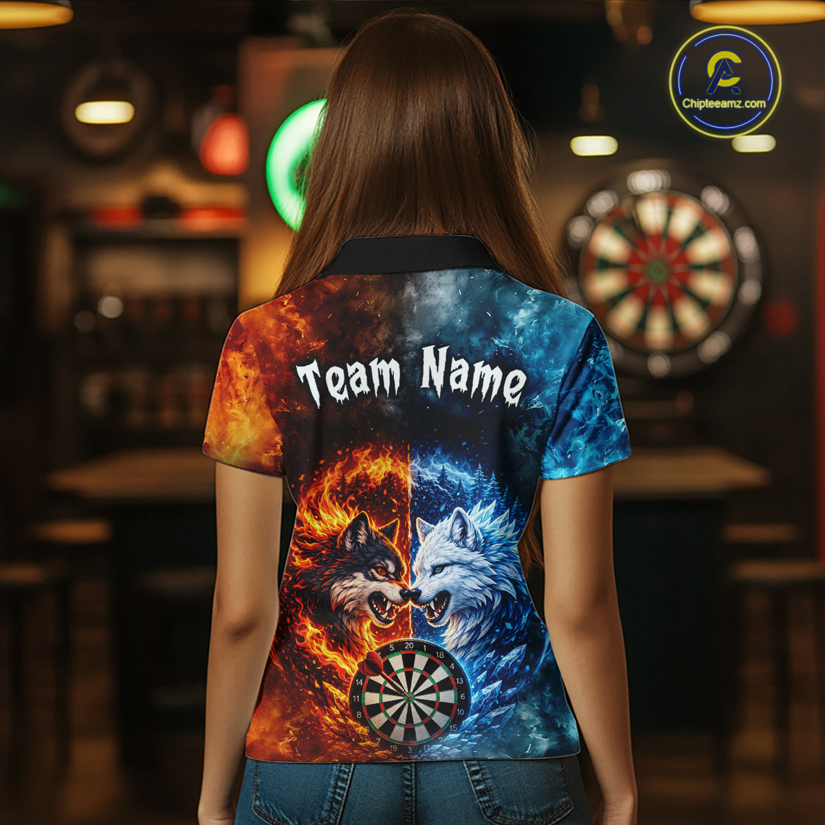 Back view of a woman wearing a custom fire and ice wolf dart polo with personalized team name and a fierce wolf, flaming dartboard, and blue icy flames in a professional dart room.