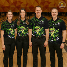 Load image into Gallery viewer, Four people standing together in a bowling alley wearing matching black short-sleeve bowling shirts with a green dinosaur and bowling ball graphic, paired with black pants.
