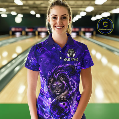 A woman wearing a purple and blue custom-printed polo shirt with a lion graphic and bowling pin design, standing in front of a blurred bowling alley background. The shirt has a custom crest and the text 'YOUR NAME'.