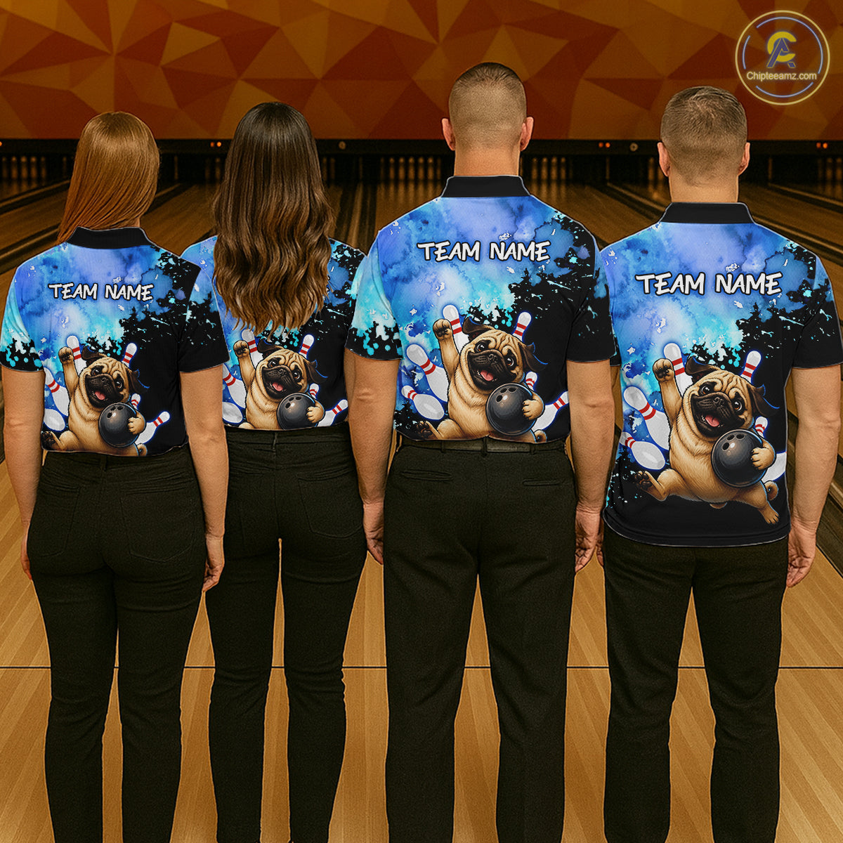 Four people standing from the back in a bowling alley, wearing matching dark blue bowling-themed short-sleeve shirts with a pug graphic and 'TEAM NAME' text, paired with black pants.