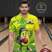 Load image into Gallery viewer, Man wearing a green and yellow bowling shirt with an avocado character holding a bowling ball in a bowling alley.