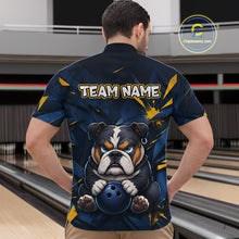 Load image into Gallery viewer, Male model wearing a custom blue bulldog bowling quarter-zip shirt back view displaying the personalized team name above a fierce cartoon bulldog graphic at the bowling alley