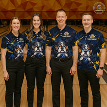 Load image into Gallery viewer, Group of four wearing custom blue bulldog bowling shirts front view featuring fierce cartoon bulldog artwork with bowling ball, gold lightning accents and navy blue abstract pattern at the bowling alley