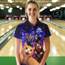 Load image into Gallery viewer, Person wearing a colorful polo shirt with cat designs in a bowling alley.