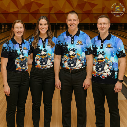Four people wearing matching bowling shirts with a cartoon penguin design on a bowling alley.