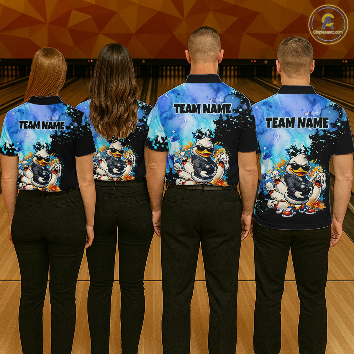Four people wearing matching bowling shirts with a cartoon character on a bowling alley.