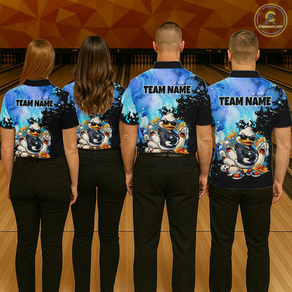 Four people wearing matching bowling shirts with a cartoon character on a bowling alley.
