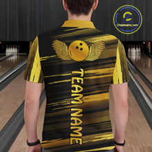 Load image into Gallery viewer, Male model wearing a custom black gold bowling polo shirt back view displaying the personalized team name below a gold bowling ball emblem at the bowling alley