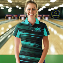 Load image into Gallery viewer, Female model wearing a custom black turquoise bowling polo shirt front view featuring a turquoise bowling ball emblem, dynamic turquoise brush stroke pattern and striped design at the bowling alley