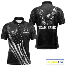 Load image into Gallery viewer, Front and back view custom black patriotic bowling polo shirt featuring a bald eagle with spread wings, American flag design and distressed grunge pattern, personalized with team name and player name