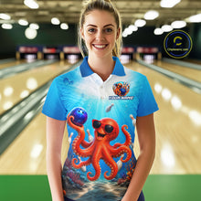 Load image into Gallery viewer, Person wearing a blue bowling shirt with an octopus design in a bowling alley.