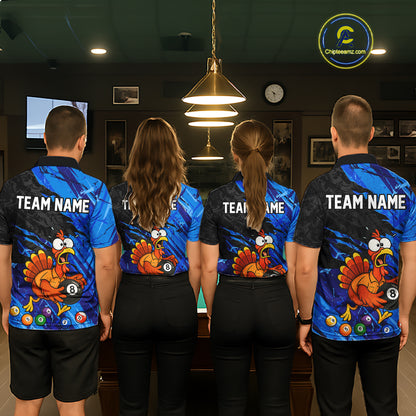 Four people standing with their backs to the camera in a dimly lit indoor room, wearing matching custom blue and black athletic jerseys with a large cartoon turkey graphic and the text 'TEAM NAME' on the back. 