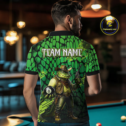 Person wearing a green and black shirt with a graphic design of a cowboy and pool ball, standing in a bar.