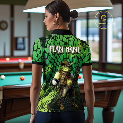 Person wearing a green and black patterned shirt with a graphic design in a pool hall.