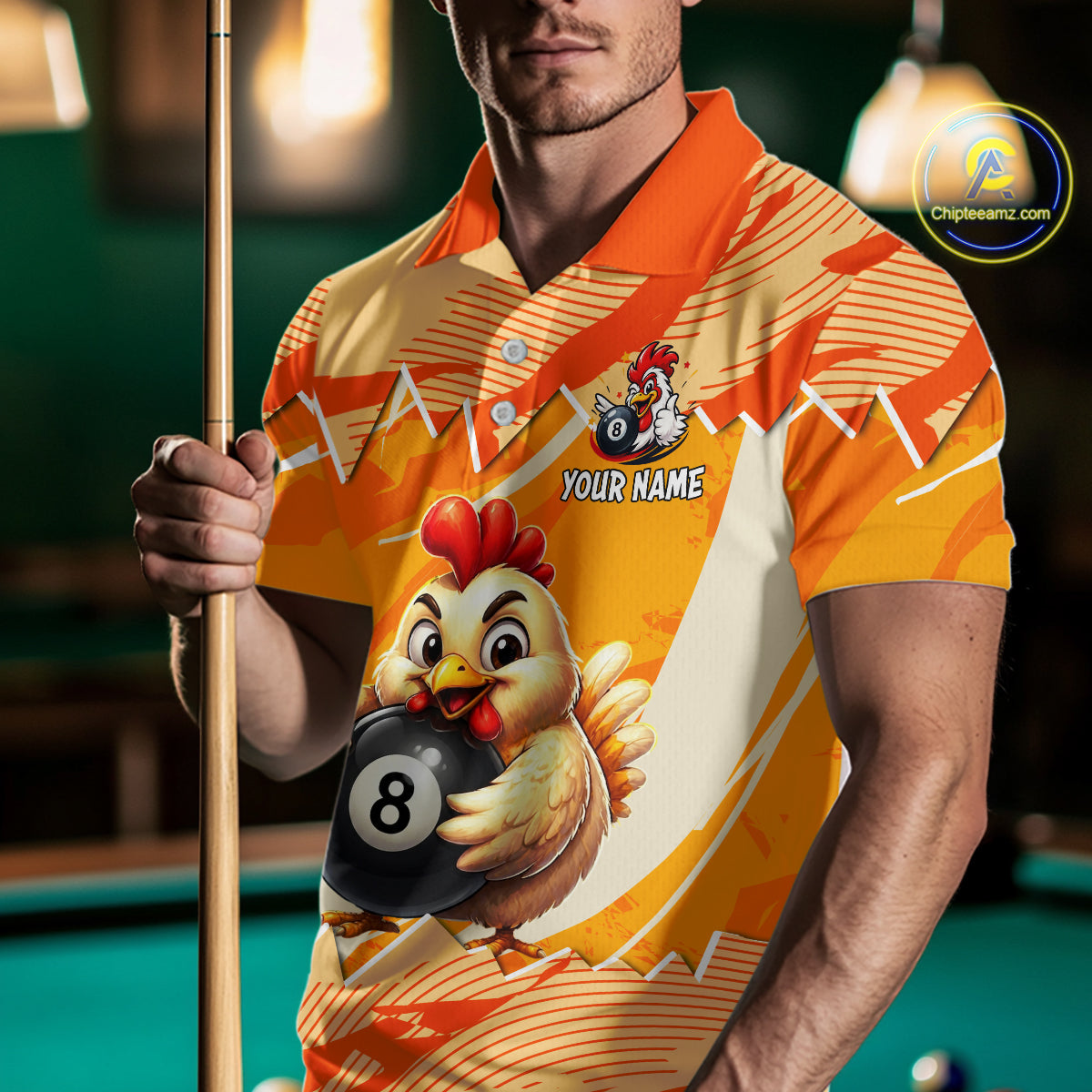 Person wearing a colorful polo shirt with a chicken and pool ball design, holding a pool cue.