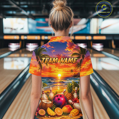 Person wearing a colorful shirt with a beach-themed design in a bowling alley.