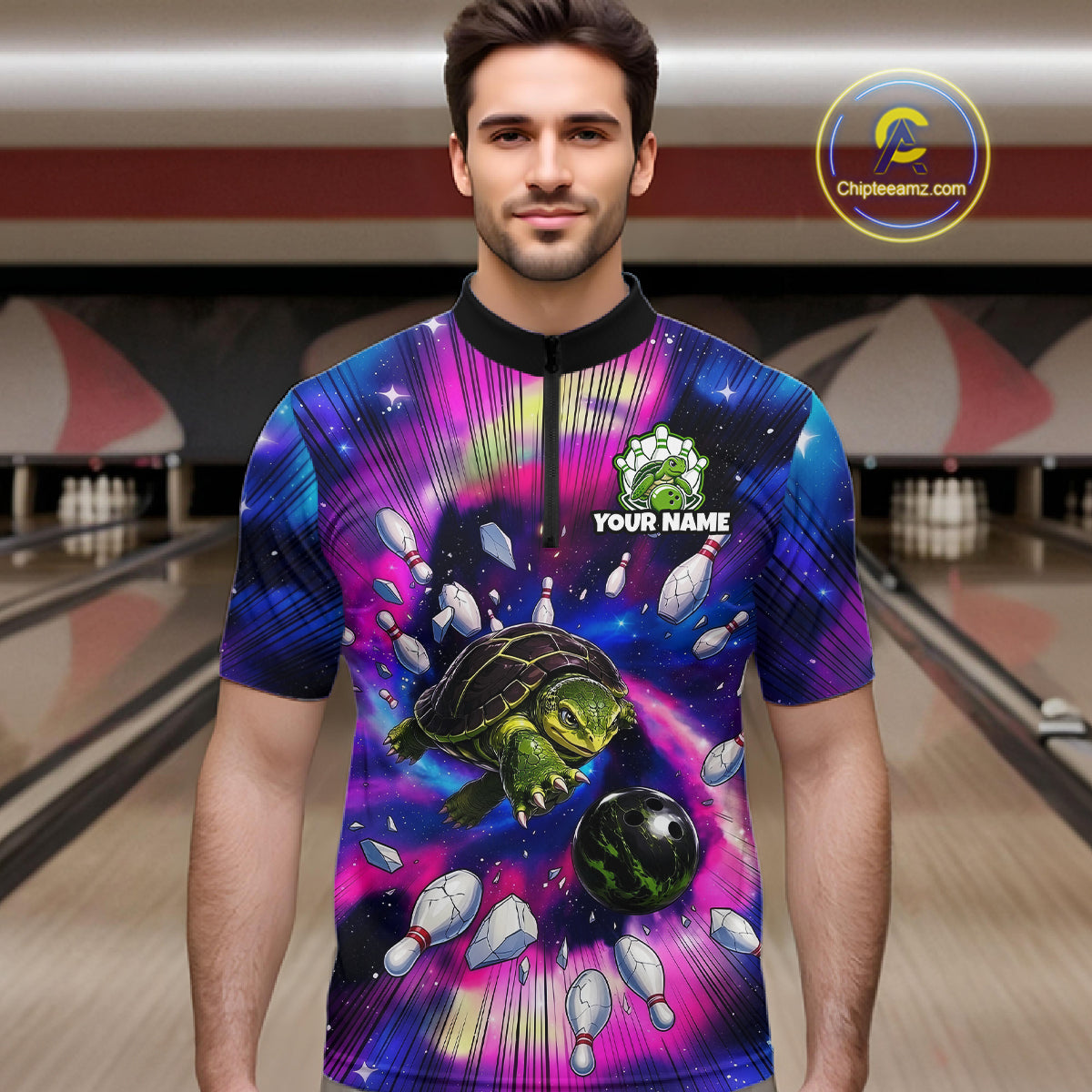 Man wearing a colorful bowling shirt with a turtle design in a bowling alley.