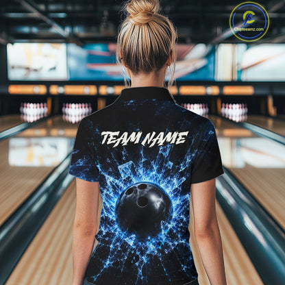 Person wearing a bowling shirt with a blue and black design and 'TEAM NAME' text in a bowling alley.