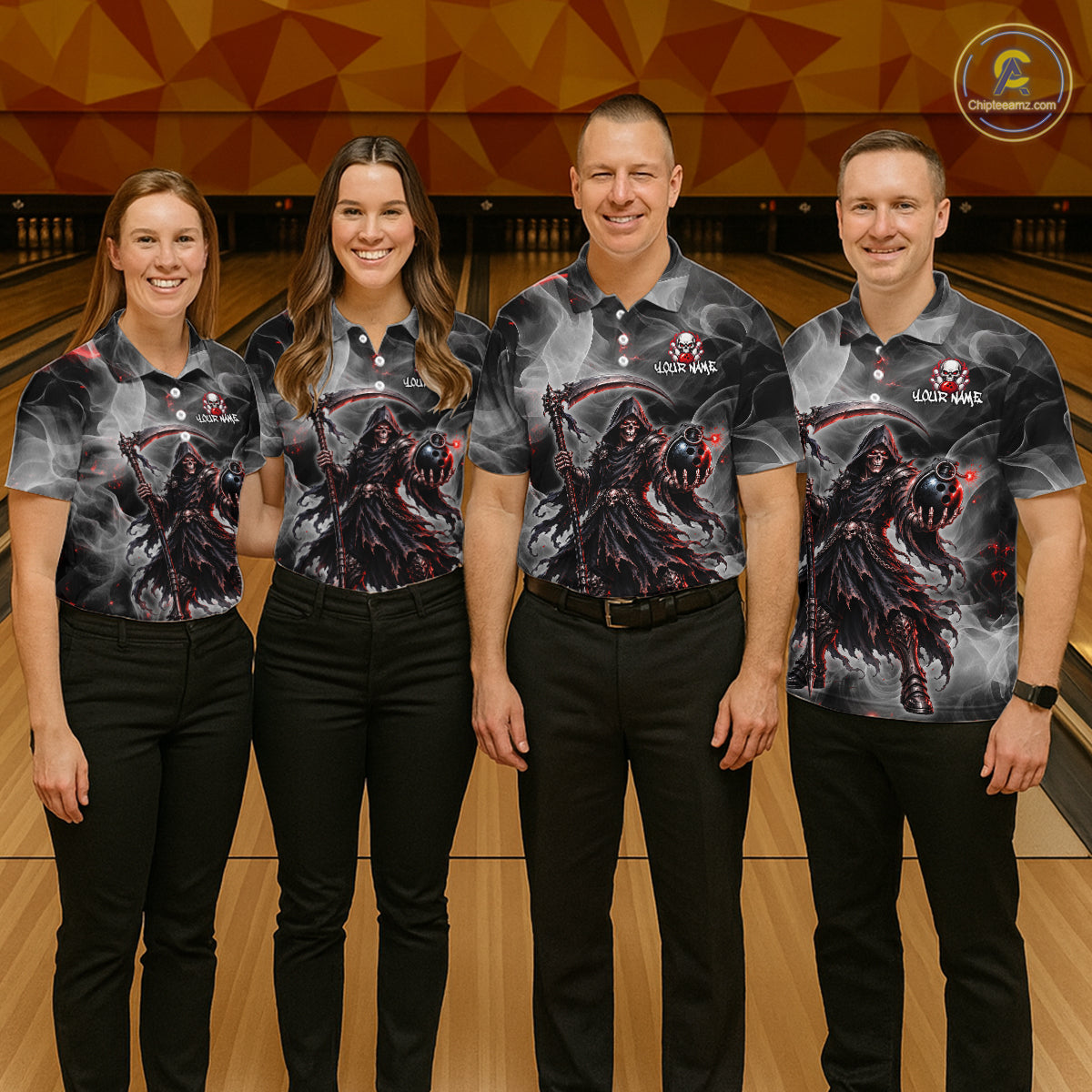 Four people standing together in a bowling alley wearing matching dark gray and black polo shirts with a large red and black hooded creature graphic on the front, paired with black pants. 