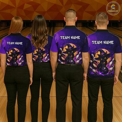 Four people standing at a bowling alley, viewed from behind, wearing matching purple and black bowling shirts with a cartoon witch and bowling pins graphic on the back and 'TEAM NAME' printed across the shoulders.