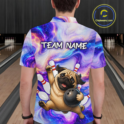Person wearing a colorful bowling-themed shirt with a pug holding a bowling ball in a bowling alley.