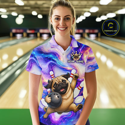 Woman wearing a colorful bowling shirt with a pug design in a bowling alley.